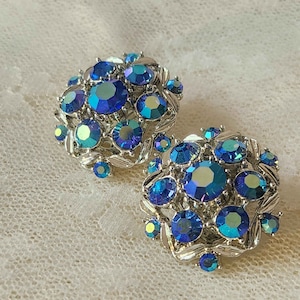 Dazzling Blue Aurora Borealis Rhinestone and Silver Tone Vintage Clip-On Earrings
