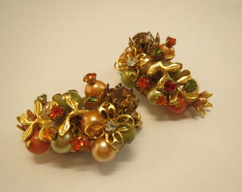 stunning floral autumn colored vintage clip on earrings