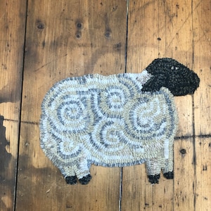 Benjamin-Rug hooked cut out sheep
