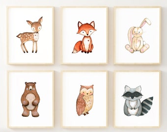 May include: Six framed watercolour illustrations of woodland animals, including a deer, fox, rabbit, bear, owl, and raccoon. The illustrations are in a neutral colour palette of brown, grey, and white.