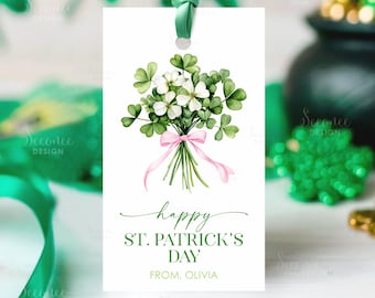 May include: A white St. Patrick's Day gift tag with a watercolor bouquet of white flowers and green shamrocks tied with a pink ribbon. The tag reads "Happy St. Patrick's Day" and "From, Olivia" in green script.