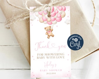 May include: Pink and white baby shower thank you tag with a teddy bear holding balloons. The tag says "Thank you for showering baby with love Hailey's Baby Shower 28.12.2094".