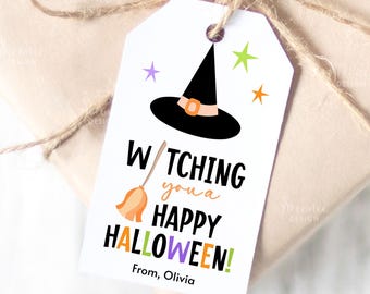 May include: A white gift tag with a black witch hat, stars, and the text "Watching you a Happy Halloween!" in black, orange, purple, and green. The tag includes a broom graphic and the name "Olivia".