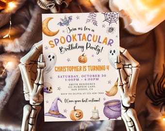 May include: A Halloween-themed birthday party invitation with a light beige background. The invitation features illustrations of a moon, bat, spiderweb, spider, ghost, pumpkin, skull, witch's hat, cauldron, broom, and candle. Text includes "Join us for a Spooktacular Birthday Party!" and party details.