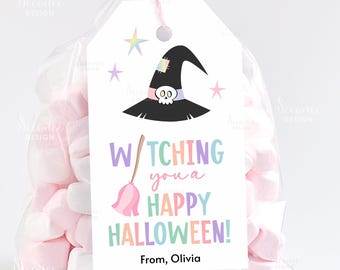 May include: A clear cellophane bag filled with pink and white marshmallows, tied with a pink ribbon. A white tag features a black witch hat with a skull, a pink broom, and the text "Witching you a Happy Halloween!" with the name "Olivia".