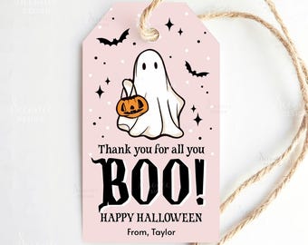 May include: A pink Halloween gift tag with a white ghost holding an orange pumpkin. The tag has black bats, stars, and the text "Thank you for all you BOO! Happy Halloween From, Taylor."
