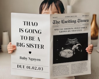 May include: A child holds a newspaper-style announcement. The headline reads "The Exciting Times" with the sub-headline "Our Family Grows by Two Feet." The announcement reveals "Thao is going to be a big sister" with the baby's name and due date.