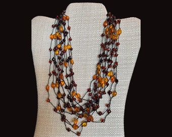 Ten Strands of Duo-Colored Amber Beads on Thin-Black-Cord w/ Amber Button Clasp, Handmade jewelry, statement jewelry, amber jewelry