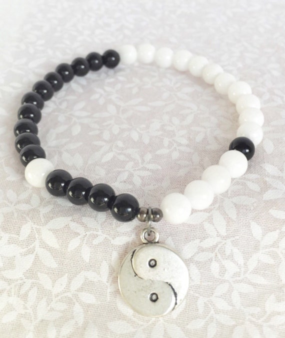 Items similar to Yin Yang black obsidian and white jade bracelet wrist ...