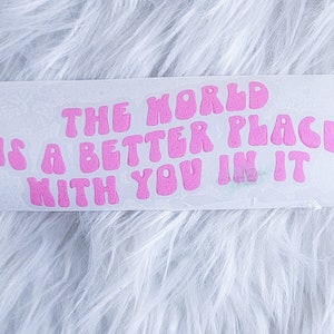 The World Is A Better Place Car Decal