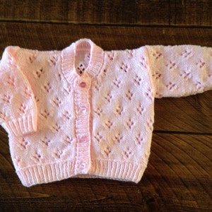 Pretty hand knitted baby cardigan available in choice of colours. Suitable for both boys and girls. image 6