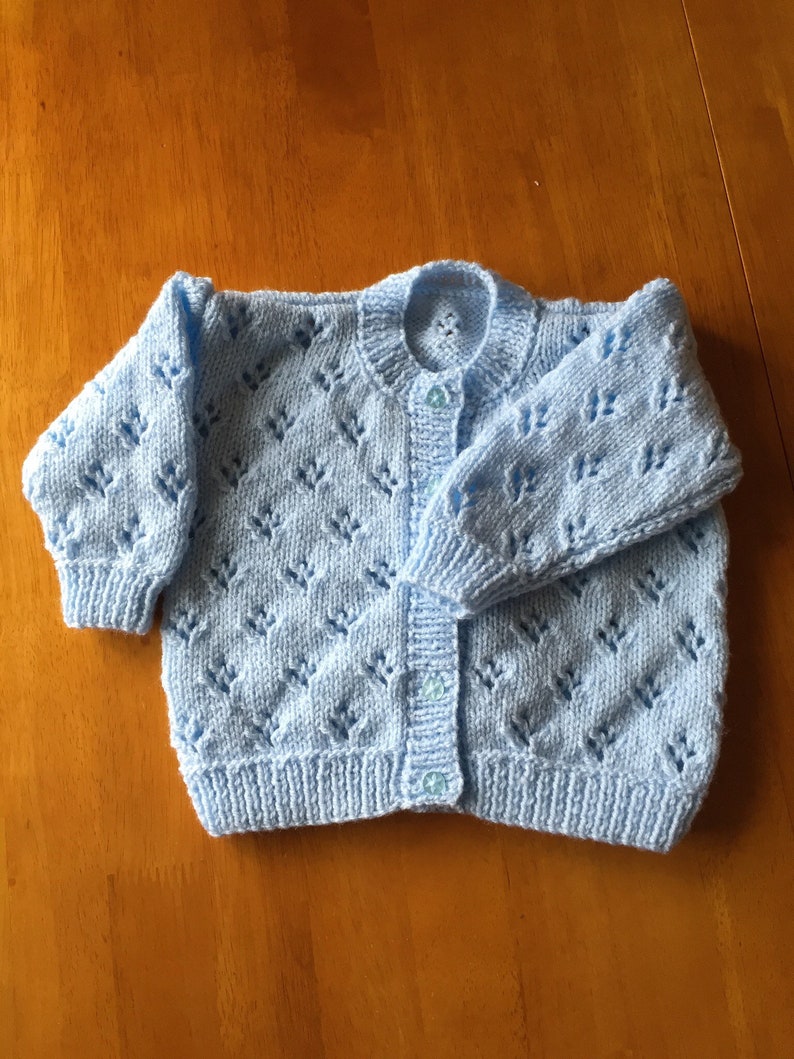 Pretty hand knitted baby cardigan available in choice of colours. Suitable for both boys and girls. image 10