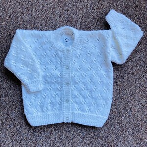 Pretty hand knitted baby cardigan available in choice of colours. Suitable for both boys and girls. image 7