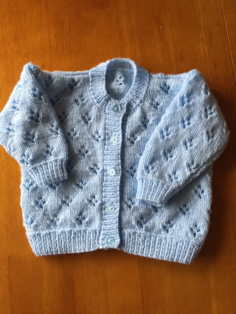 Pretty hand knitted baby cardigan available in choice of colours. Suitable for both boys and girls. image 9