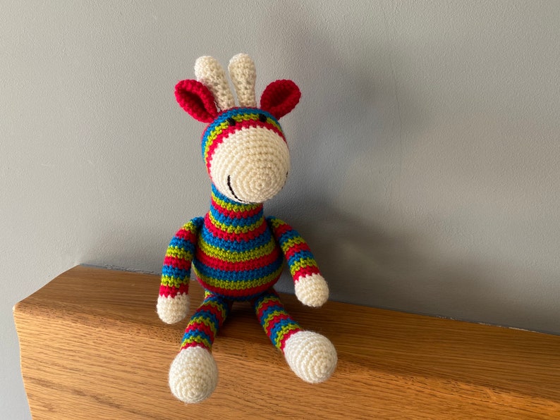 Brightly coloured striped crochet giraffe image 1