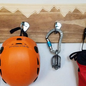 Rock climbing gear storage board hanger mountain board