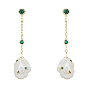 May include: A pair of gold drop earrings featuring a vertical chain with two small round green stones and a large, irregular white baroque pearl at the base. The pearl is accented with three small, embedded round green stones in gold settings.