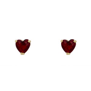 May include: A pair of gold heart-shaped stud earrings with red gemstones.