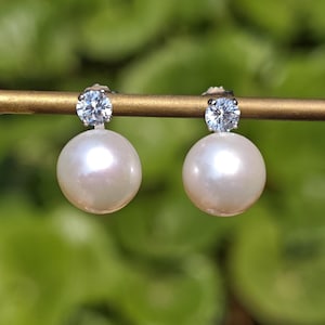 Edison Pearl Earrings: 10-11mm Round Freshwater Pearl