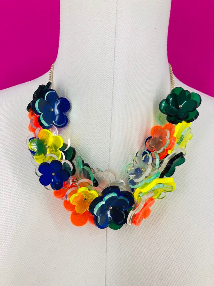 Plastic flower necklace sale