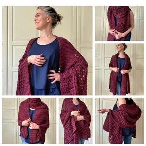 May include: A maroon crocheted shawl with a lacy pattern. The shawl is shown being worn in different ways, including draped over the shoulders, wrapped around the neck, and tied at the waist.