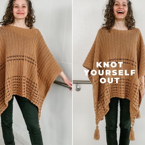 May include: A brown crochet poncho with a fringe trim and the text "Knot Yourself Out" on the front.