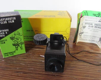 Vintage 1970's SNAPSHOOTER CAMERA with Original Box, Film Box with 126 Film Cartridge Not Opened, Instructions and Return Processing Package