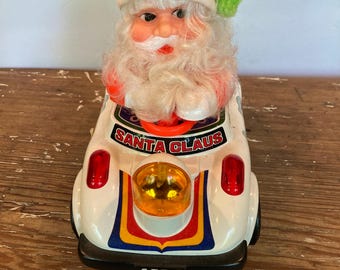 Coche de juguete Santa Bump'G Go de 1983, funciona con pilas.