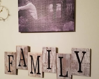 Rustic family sign made from reclaimed wood.