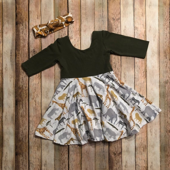 green giraffe print dress Black Giraffe Print Midi Dress – Curvaceous Boutique main image 0