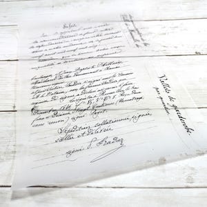 May include: A vintage, translucent document with handwritten script in black ink. The document is layered, with text visible on both sheets. The paper is slightly wrinkled, suggesting age. The text includes the phrase "Vallets de garderobe."