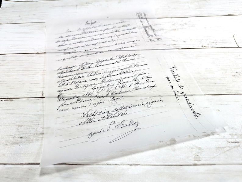 May include: A vintage, translucent document with handwritten script in black ink. The document is layered, with text visible on both sheets. The paper is slightly wrinkled, suggesting age. The text includes the phrase "Vallets de garderobe."