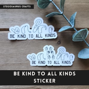 May include: White sticker with black line drawings of hearing aids, a magnifying glass, a cup, and hands. The text "BE KIND TO ALL KINDS" is repeated three times. The bottom text reads "STICKER".