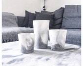 Small marble planters in concrete, in white and grey marblelised cement