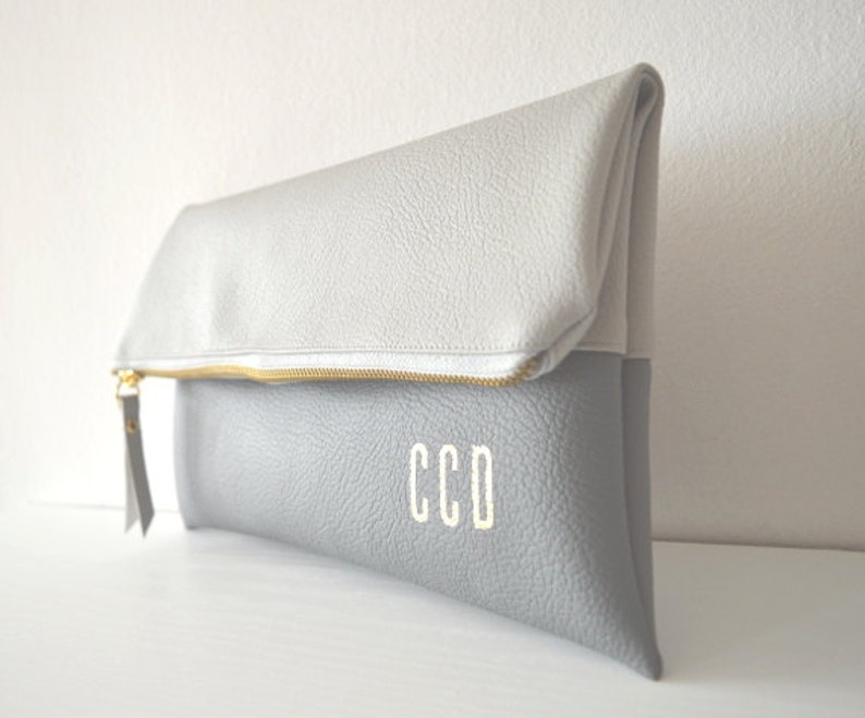 pale grey patent clutch bag