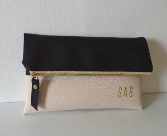 black and cream clutch bag