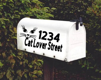 May include: White mailbox with a black cat face and the text "1234 Cat Lover Street" on it.