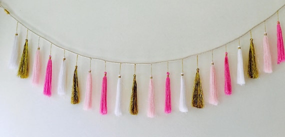 pink and gold tassel banner