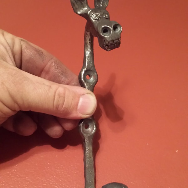 Hand forged Donkey wall hook. Every one is unique and has its own personality.