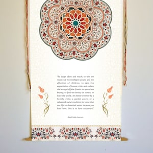 May include: A white scroll with a colorful mandala design and a quote by Ralph Waldo Emerson. The quote reads, "To laugh often and much; to win the respect of the intelligent people and the affection of children; to earn the appreciation of honest critics and endure the betrayal of false friends; to appreciate beauty; to find the beauty in others; to leave the world a bit better whether by a healthy child, a garden patch, or a redeemed social condition; to know that one life has breathed easier because you lived here. This is to have succeeded."