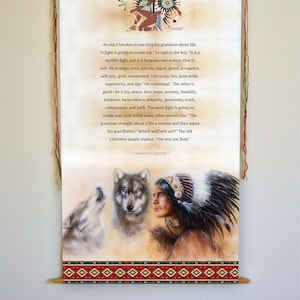 May include: A vintage-style scroll with a Cherokee legend about two wolves, one representing good and the other evil. The scroll features a Native American man with a wolf on each side, one howling at the moon. The text reads, "A fight is going on inside me...The one you feed."