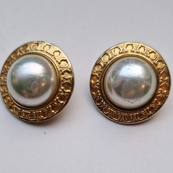 Pair of CELINE ear clips in gold metal and pearl