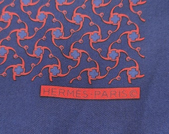 Hermès pocket scarf 16,5 in x 16,5 in vintage silk classic patterns on a navy blue background