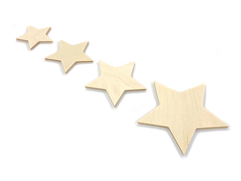 May include: Four unfinished wooden stars of varying sizes arranged in a row, with the largest star on the right and the smallest star on the left.