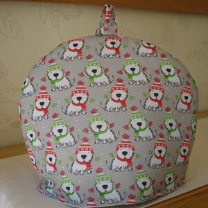 Handmade Christmas Tea Cosy With Little Dogs Wearing Hats And Scarves
