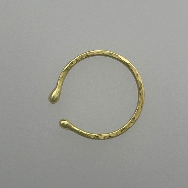 Gold ear cuff with hammered texture