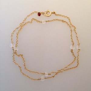 18k solid gold chain wrap bracelet with rock crystal and garnet