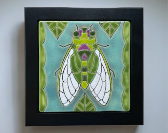 cicada in foliage handmade and hand glazed ceramic 8" x 8" framed art tile