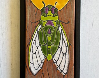 Cicada on a tree bathed in moonlight  handmade and hand glazed ceramic framed art tile