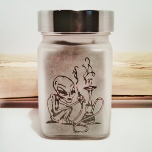 Out of this World Alien Stash Jar - Hookah Smoking Alien Etched Glass Herb Storage for Aliens and Stoner Gifts Must-Have Weed Accessories - Perfect for Storing Cannabis, Herbs, and More - A Great Gift for Any Stoner or Alien Lover in Your Life